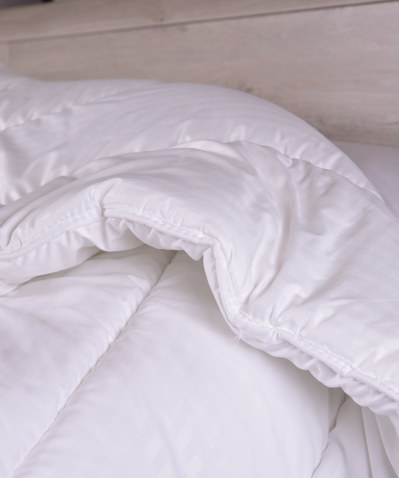 Couette synthétique Okö – Moelleuse, chaude et économique